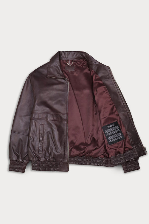 A dark brown leather jacket with a matching satin-lined interior, laid flat against a light gray background.