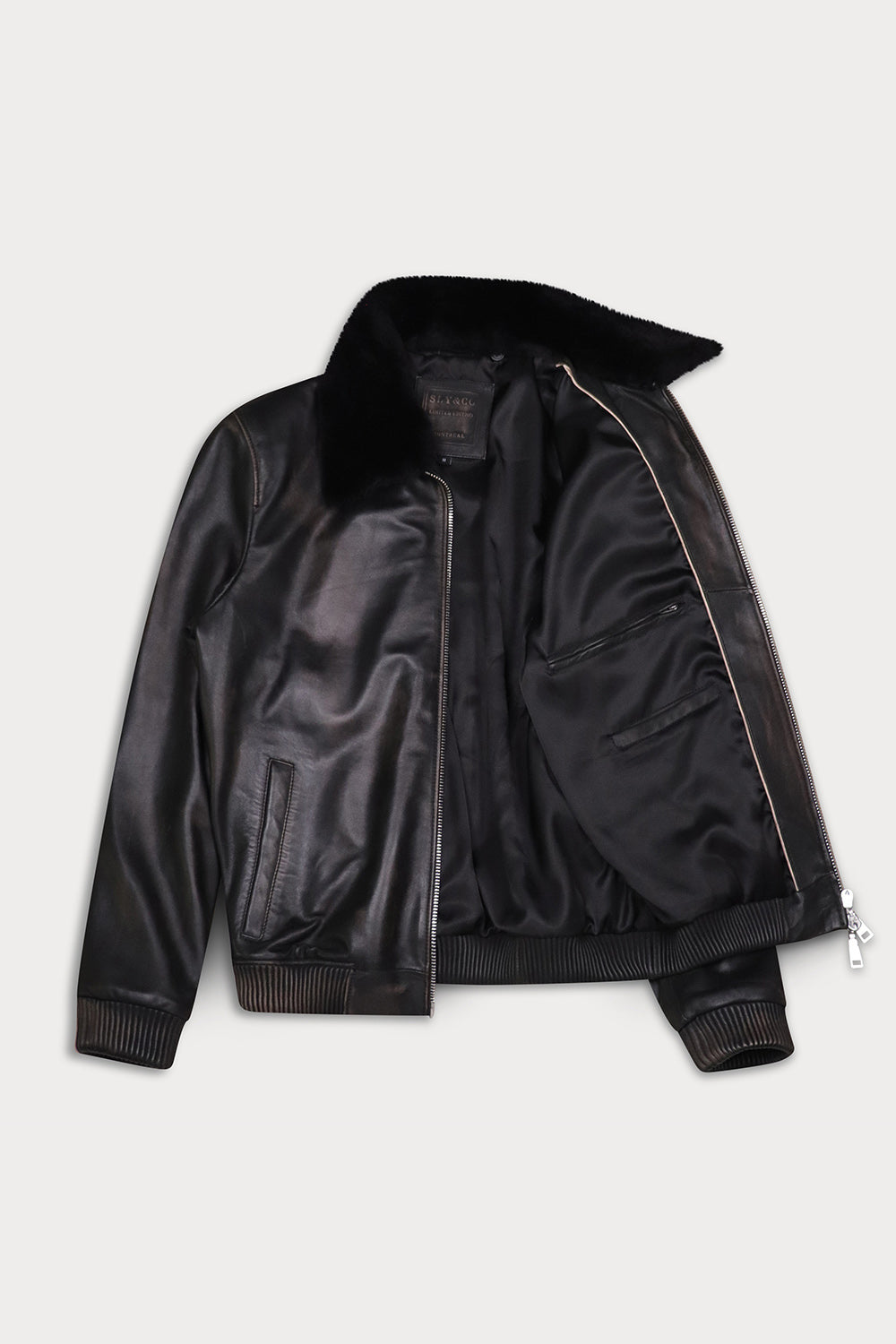 A black leather bomber jacket with a black shearling-style collar, shown open 
