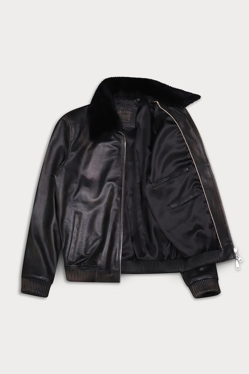 A black leather bomber jacket with a black shearling-style collar, shown open 