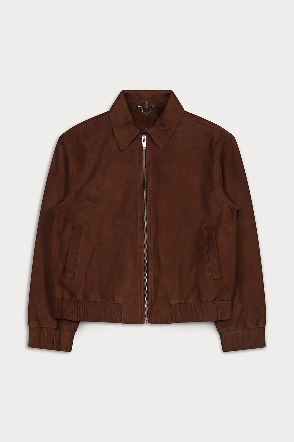 A brown suede jacket with a zippered front, pointed collar, and ribbed cuffs and hem.
