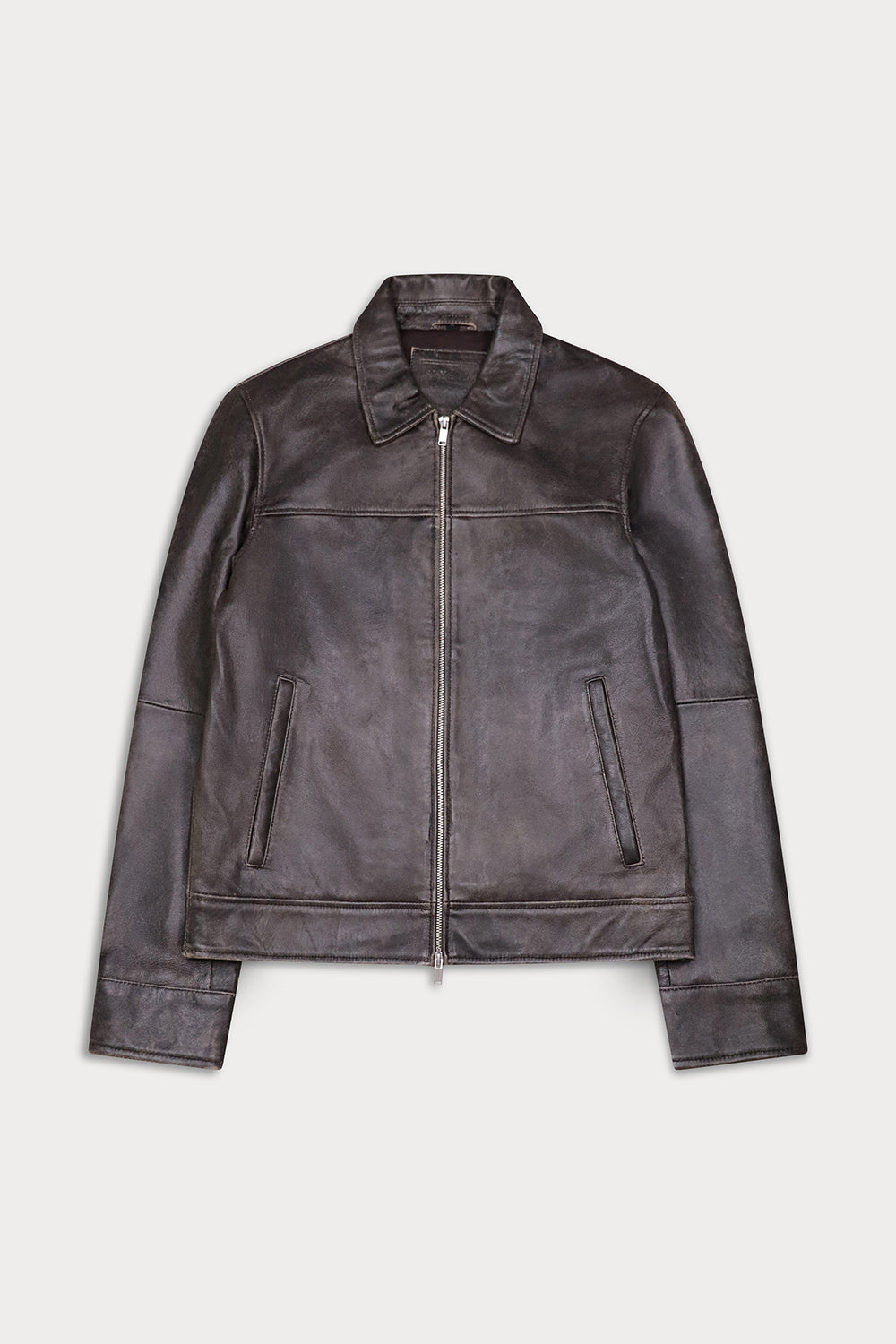 A dark brown leather jacket with a front zipper, collar, and zippered side pockets, distress finishing.