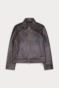 A dark brown leather jacket with a front zipper, collar, and zippered side pockets, distress finishing.