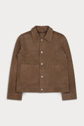 A suede jacket with a button-up front, pointed collar, and two front flap pockets.