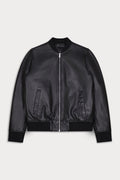 A black leather bomber jacket with a silver front zipper, ribbed collar, cuffs, and hem, displayed flat against a light gray background.