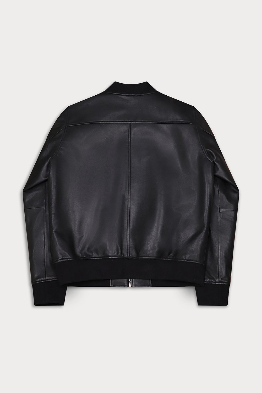 Black leather bomber jacket shown from the back, featuring a ribbed collar, cuffs, and hem.