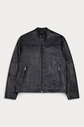 A black leather jacket with a front zipper, stand-up collar, and two zippered pockets on the lower front.