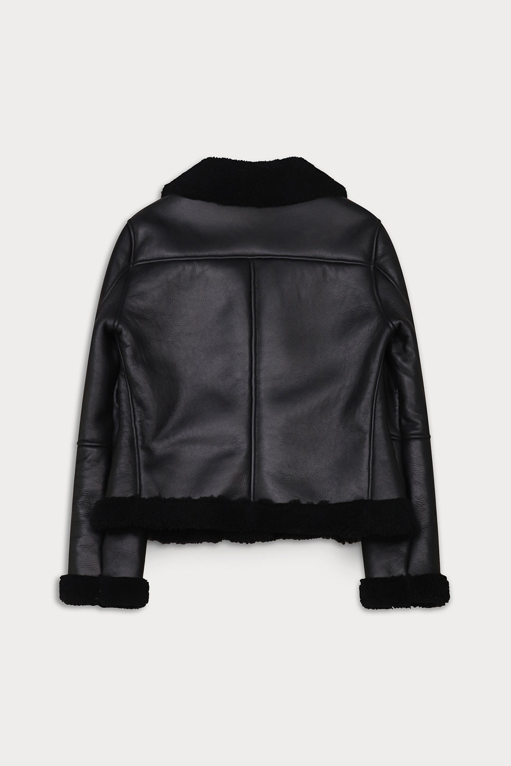 The Saint Saddle is a short shearling perfecto from Sy&Co.