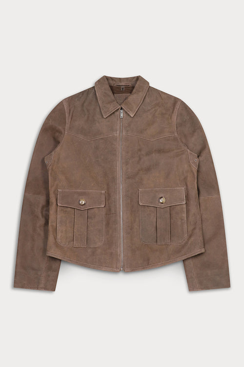A brown suede jacket with a pointed collar, front zipper, and two large buttoned flap pockets on the chest.