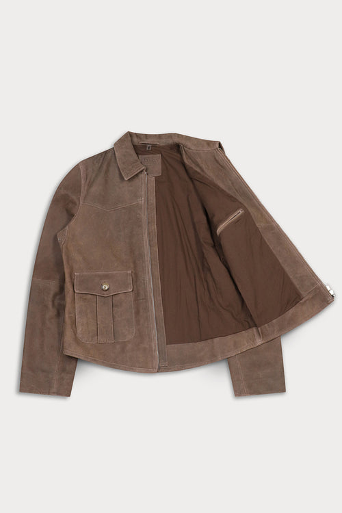 A brown suede jacket with a pointed collar, front flap pocket, and zippered closure.