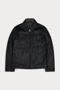 A black leather jacket with a zippered front, collar, two chest flap pockets, an interior vest. Sandro-Sly&Co
